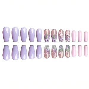 Pastel lavender and pink long coffin press-on nails with purple floral relief and glossy finish