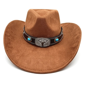 Detail of western brown suede cowboy hat with bull head buckle and turquoise studs