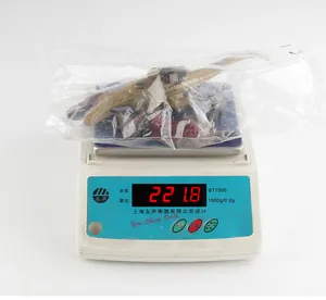 Detailed view of triceratops toy set on a scale weighing 221.8g in a plastic bag