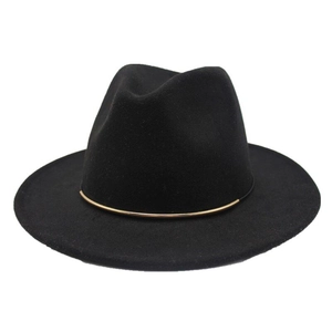 Detail of black wool fedora hat featuring a stylish gold metal ring on the crown