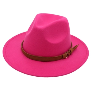 Close-up of rose red wool fedora hat featuring a stylish brown leather belt buckle band