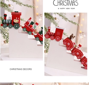 Detailed view of festive wooden Christmas train ornaments with snowman and reindeer characters