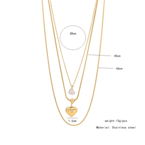 Three-layer gold stainless steel necklace with heart pendants and sizing measurements