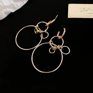 Minimalist geometric circular multi-ring earrings in two-tone gold and silver finish