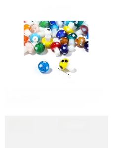 Macro view of colorful handmade glass mushroom beads showing sizes 16mm and 14mm for DIY jewelry