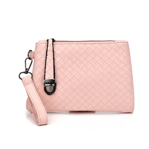 Close-up of pink woven synthetic leather texture on clutch bag with metal zipper