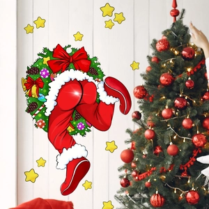Vue détaillée du sticker mural Père Noël sur surface blanche avec un sapin de Noël