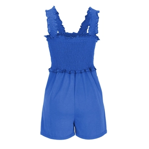 Detail of blue summer romper featuring smocked bodice and ruffled strap design