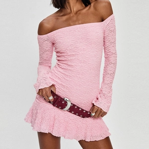 Detail of pink off-shoulder lace mini dress showing textured 3D floral pattern fabric