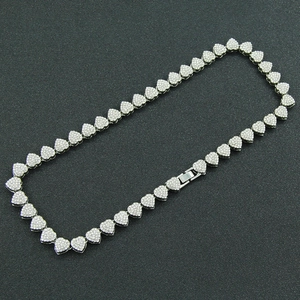 Close-up of silver-toned hip hop heart tennis chain with micro-pave cubic zirconia