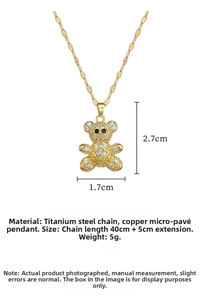 Detail view of teddy bear pendant necklace with dimensions 2.7x1.7cm and zircon inlay