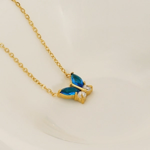 Gold stainless steel O-chain necklace featuring a butterfly pendant with blue zircon stones