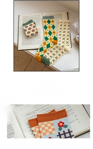 Detail of high-elastic knit cuffs on cotton mid-calf socks with vintage patterns