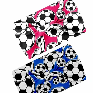 Close-up of pink and blue soccer print elastic sports headbands made of breathable fabric