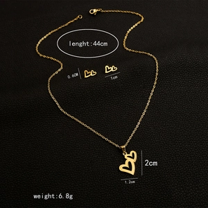 Detailed view of gold stainless steel heart necklace and earrings set with measurements