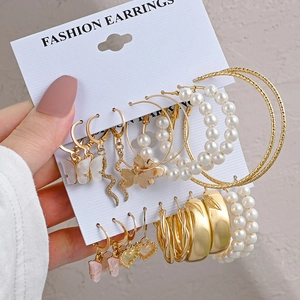 Vintage gold geometric earring set featuring pearls and butterfly charms for women