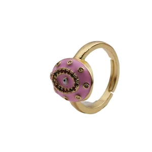 Detail of pink enamel evil eye ring with colorful zircons and adjustable gold band