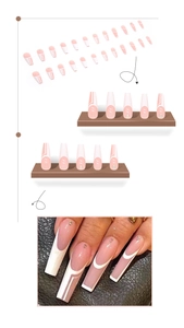Close-up of pink and white coffin fake nails with geometric lines and rhinestones