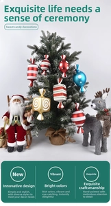 Detail of colorful striped Christmas candy ornaments hanging on a festive tree