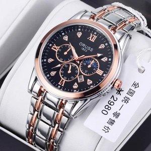 Macro detail of ORUSS luxury watch with luminous markers and steel strap