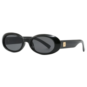 Retro oval black sunglasses with thick frames and golden metal temple details