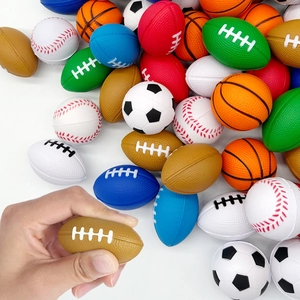 Assorted mini foam sports stress balls being squeezed for anxiety relief and fun