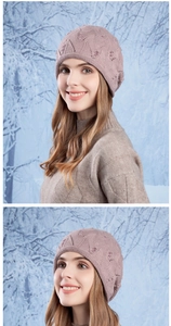 Detail of pink knit beanie with wave pattern texture and elegant pearl embellishments