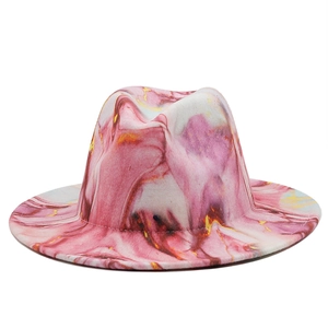 Detail of pink and white marble pattern wool fedora hat with elegant gold liquid lines