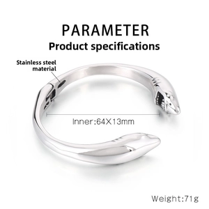 Detail view of silver stainless steel shark bangle with teeth carving and 64x13mm size