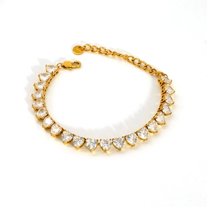 Detail of stainless steel tennis bracelet with heart-shaped cubic zirconia and lobster clasp