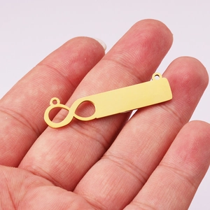 Golden infinity sign with blank bar pendant for custom engraving in polished steel