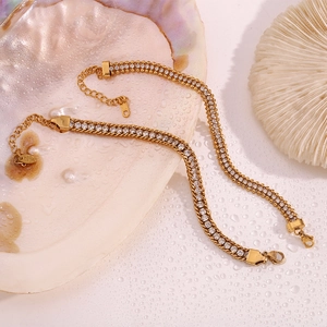 Detail of 18K gold-plated double-row zircon chain with lobster clasp and extension