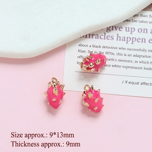 Close-up of dragon fruit charms in gold-plated copper for DIY jewelry making