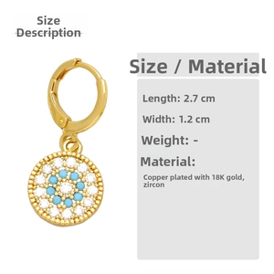 Detail view of Evil Eye earrings with 18K gold plating, measuring 2.7cm by 1.2cm