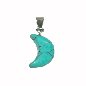 Macro shot of turquoise crescent moon pendant with natural black veins and silver bail
