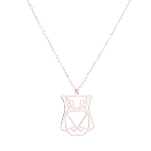 Close-up of minimalist rose gold origami owl pendant on a delicate chain necklace