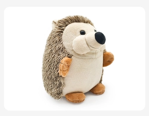 Detailed view of the soft faux fur texture and cute hedgehog plush doll profile