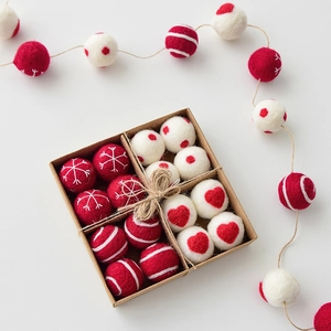 Red and white wool felt Christmas balls set with snowflake patterns and gift box