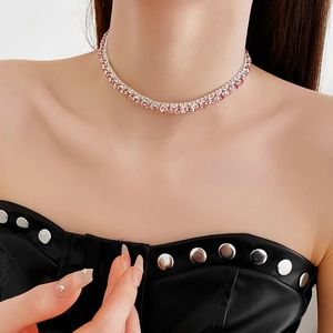 Macro view of a double-row pink and white crystal rhinestone choker necklace on model