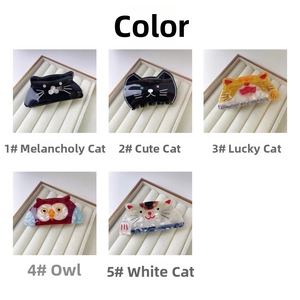 Vue détaillée de cinq pinces à cheveux chat et hibou en acétate de différents styles et couleurs