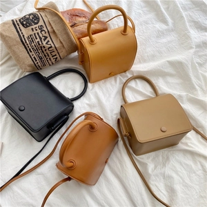 Retro PU leather small square bags in four colors with round handles and straps