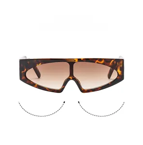 Detail of tortoiseshell oversized sunglasses with a gradient lens and a one-piece design