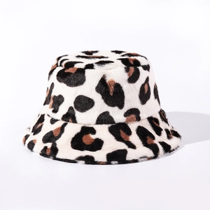 Detailed close-up of soft faux fur texture and leopard pattern on the winter bucket hat