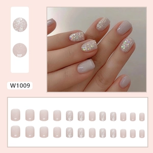 Short press-on nails in nude pink with silver glitter, set of 24 pieces in model W1009