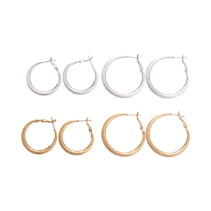 Set of four brushed matte 18k gold and silver hoop earrings in large and small sizes
