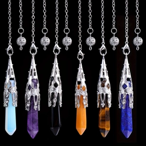 Set of six natural hexagonal crystal point necklaces with ornate silver flower caps
