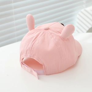 Pink kids baseball cap with cute 3D bunny ears and adjustable velcro strap back detail