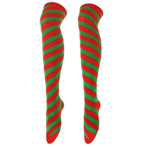 Macro detail of high-quality red and green diagonal striped over-the-knee socks for Christmas