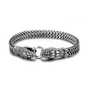 Retro stainless steel woven bracelet featuring a silver double-headed dragon clasp design