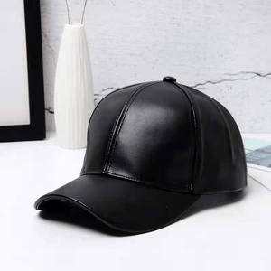 Classic black PU leather baseball cap with a smooth polished finish and minimalist design